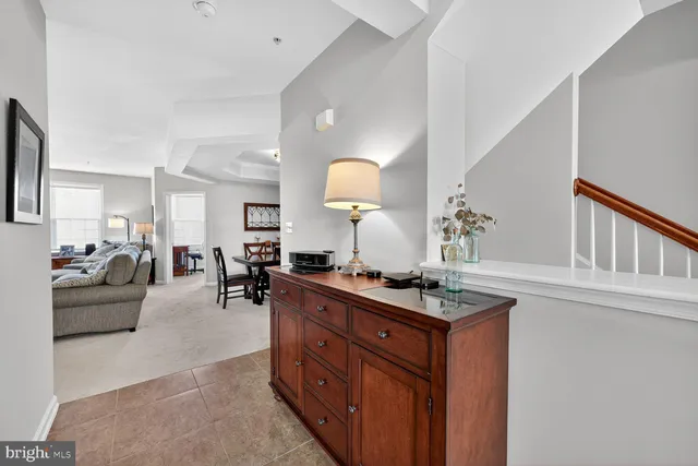 a view of a hallway view with three rooms