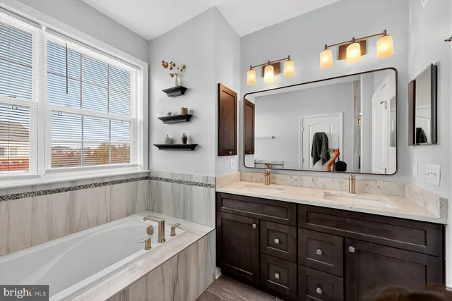 a view of a bedroom with washer and dryer