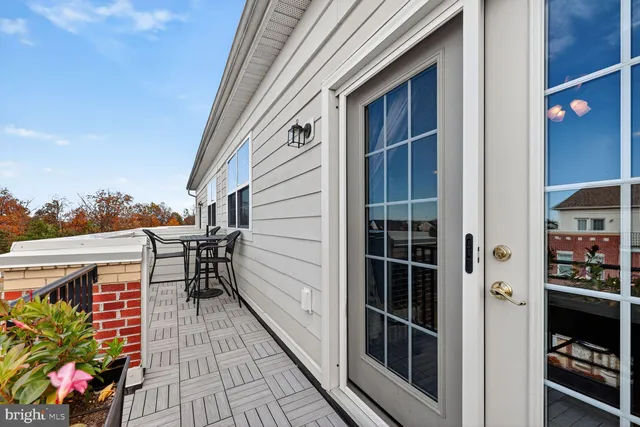 a view of a swimming pool with lounge chair