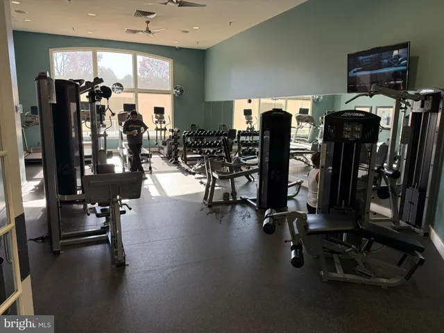 a view of a wooden bench sitting in backyard