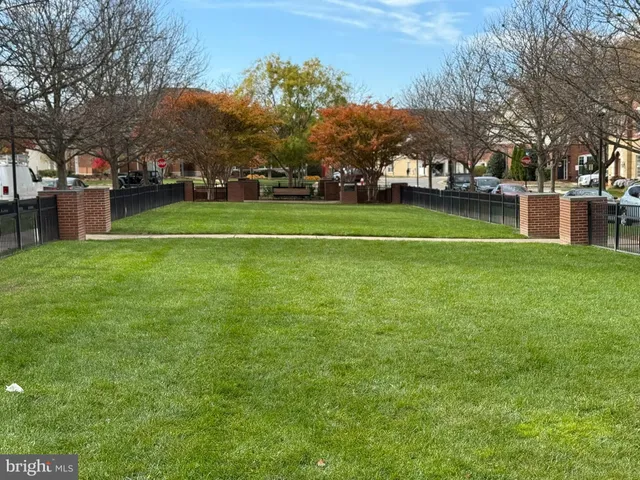 a view of a car parked in front of a building