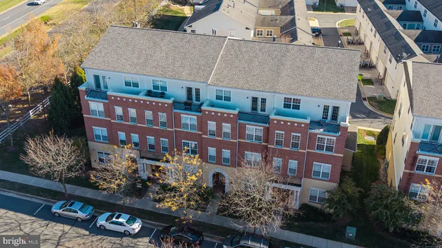 a front view of a building with a street