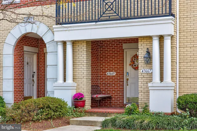 a kitchen with stainless steel appliances granite countertop a stove sink microwave and cabinets