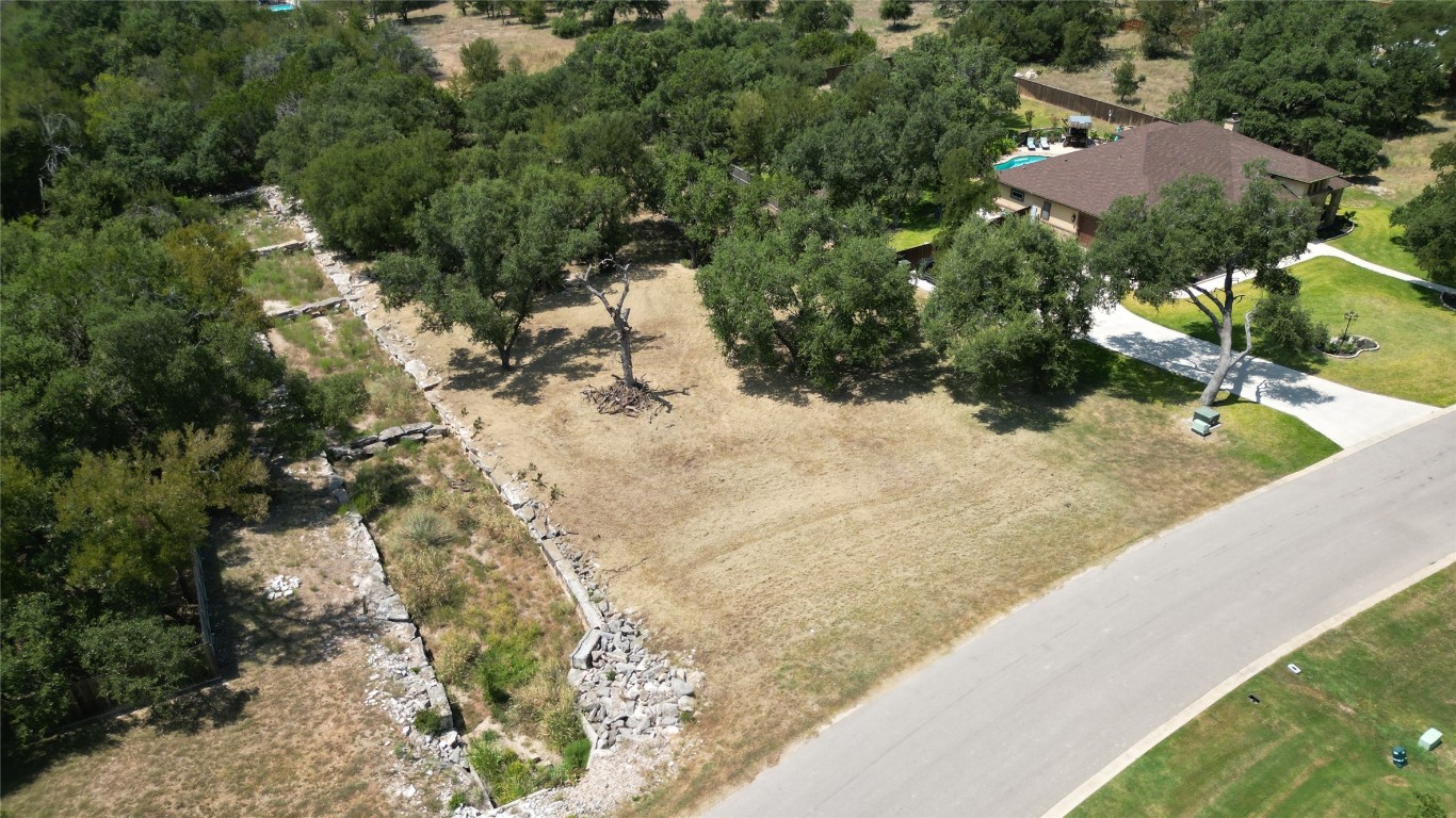 8378 Spring Creek Loop Salado, TX 76571 - Photo 2 of 13 a view of a backyard of a house