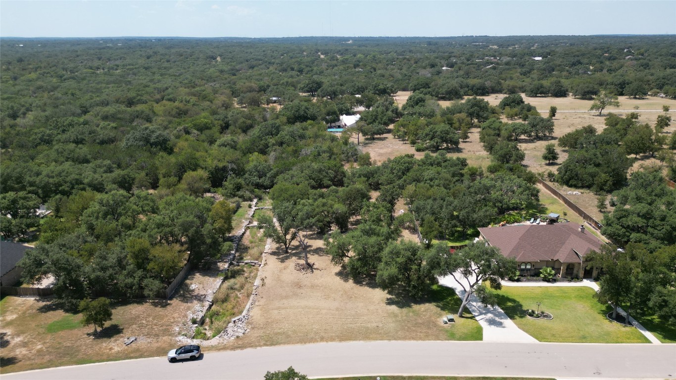 8378 Spring Creek Loop Salado, TX 76571 - Photo 3 of 13 an aerial view of residential houses with outdoor space