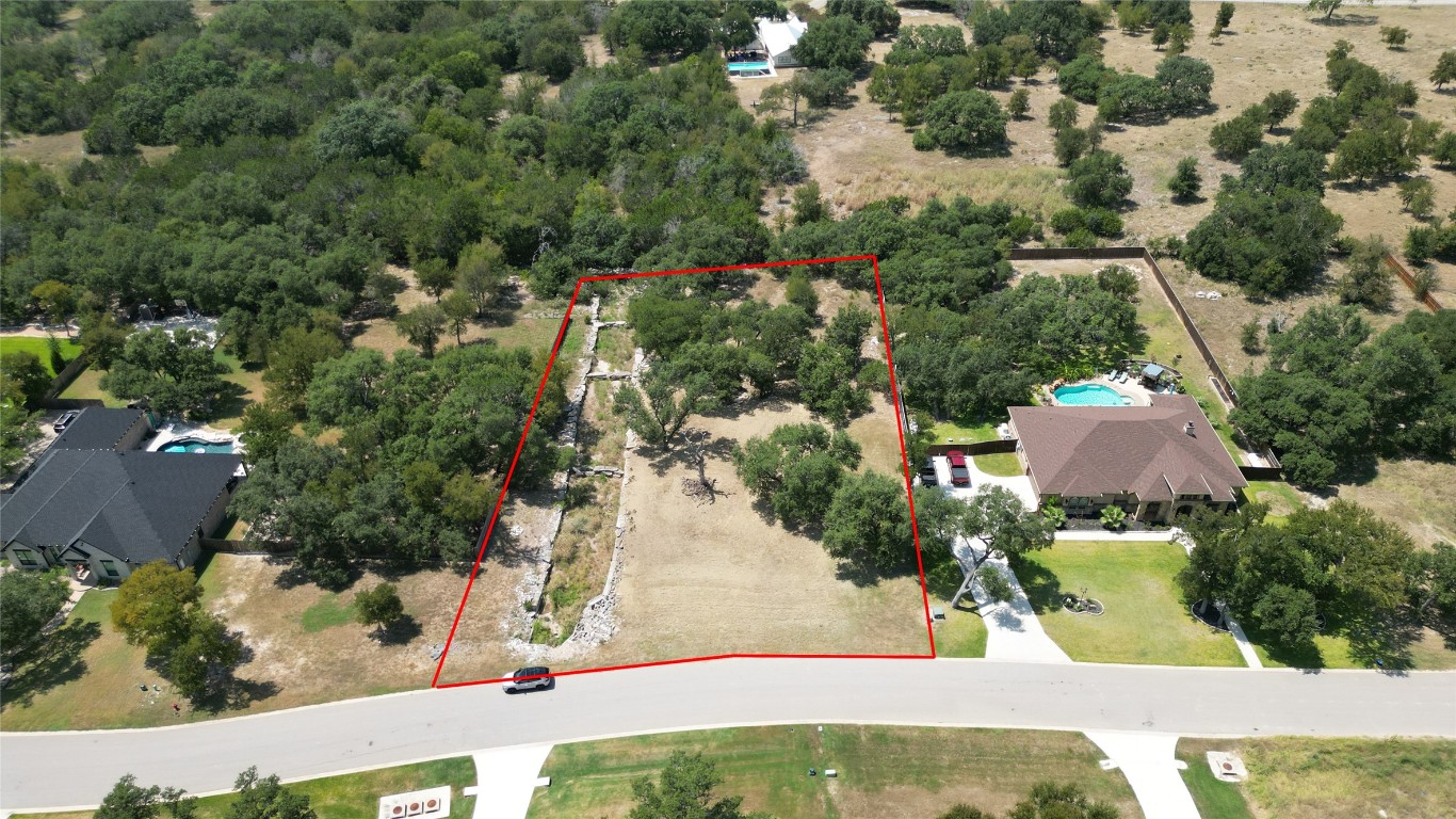 8378 Spring Creek Loop Salado, TX 76571 - Photo 4 of 13 an aerial view of residential houses with outdoor space