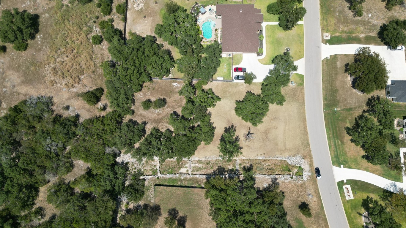 8378 Spring Creek Loop Salado, TX 76571 - Photo 6 of 13 an aerial view of a house with a yard