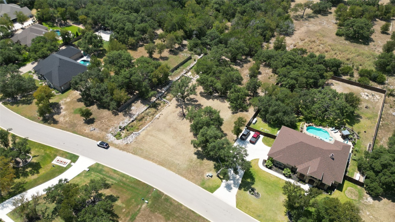 8378 Spring Creek Loop Salado, TX 76571 - Photo 9 of 13 an aerial view of residential houses with outdoor space and trees all around