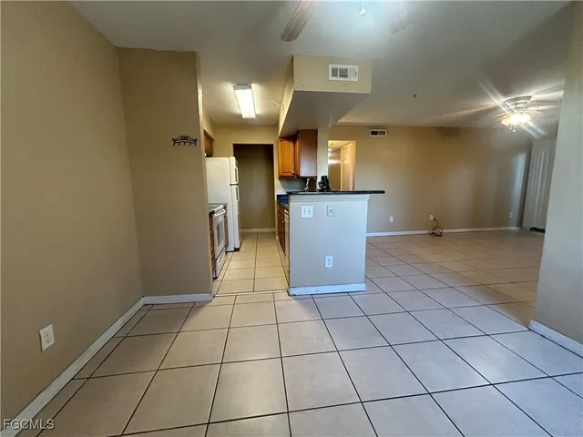 a view of a kitchen with a sink