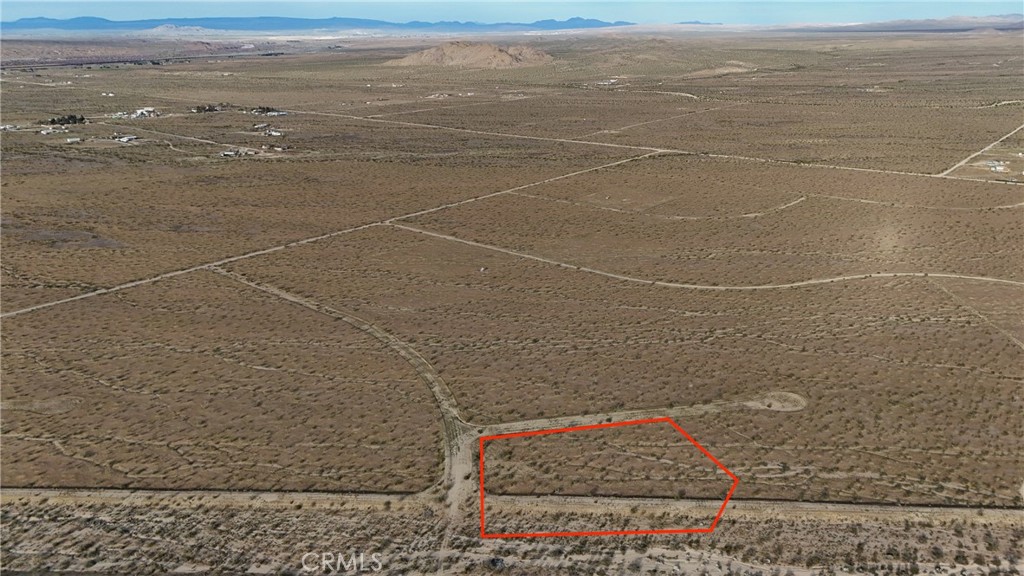 715 Corral Road Helendale, CA 92342 - Photo 3 of 10 Red boundary lines on pictures are an estimate and for marketing purposes only. Buyer to verify all aspects of this property including, but not limited to utilities, assessments, boundaries, usage, access, and zoning to satisfy themselves.