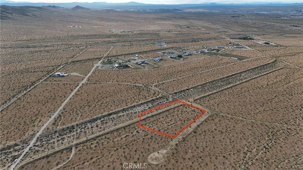 715 Corral Road Helendale, CA 92342 - Photo 5 of 10 Red boundary lines on pictures are an estimate and for marketing purposes only. Buyer to verify all aspects of this property including, but not limited to utilities, assessments, boundaries, usage, access, and zoning to satisfy themselves.