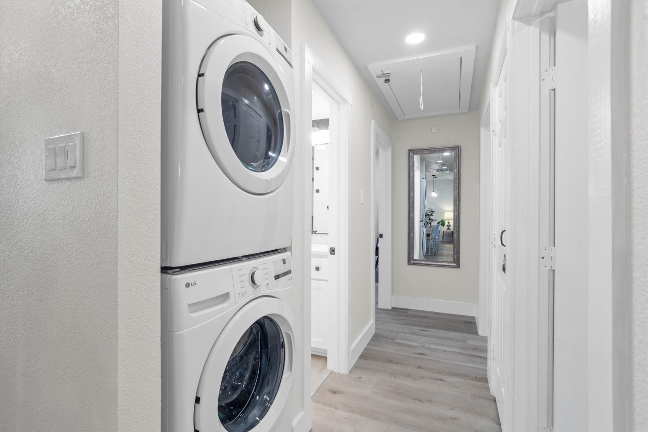 3138 Sunbeam Street Houston, TX 77051 - Photo 28 of 50 Smartly designed with modern finishes and built-in convenience, this sleek laundry space keeps daily living effortlessly organized.
