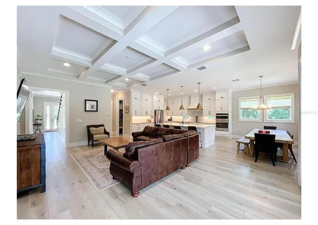 a spacious bathroom with a granite countertop sink mirror and a