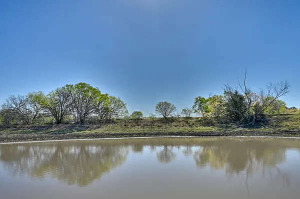 an aerial view of mountain with beach