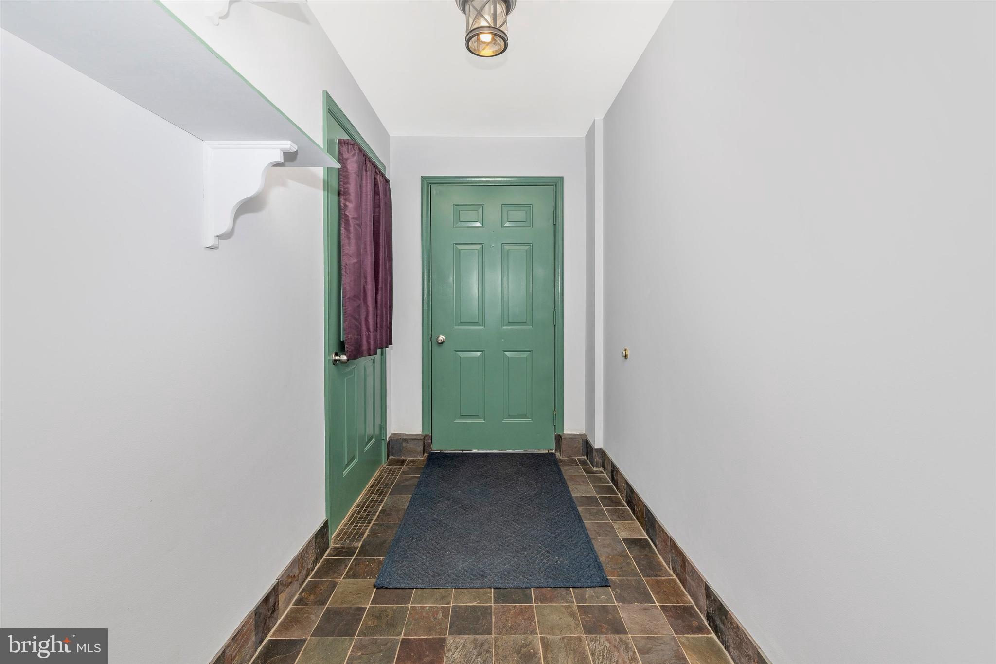 13942 Prospect Road Mount Airy, MD 21771 - Photo 3 of 69 Slate tile foyer with entrance to garage #1