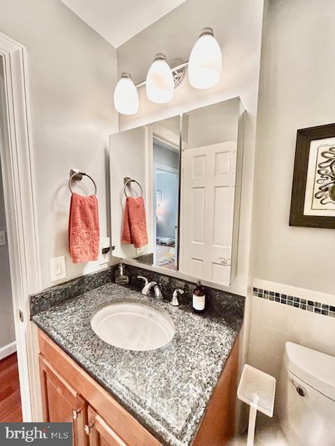 2351 Generation Drive Reston, VA 20191 - Photo 20 of 45 a bathroom with a granite countertop sink and a mirror
