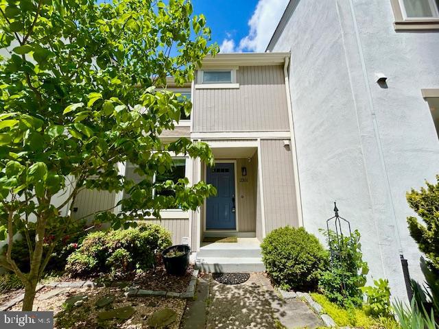 2351 Generation Drive Reston, VA 20191 - Photo 2 of 45 a front view of a house with garden