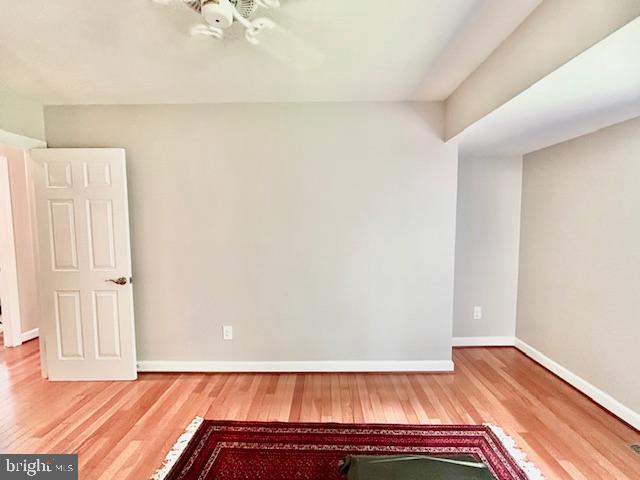 2351 Generation Drive Reston, VA 20191 - Photo 23 of 45 a view of a room with wooden floor and closet