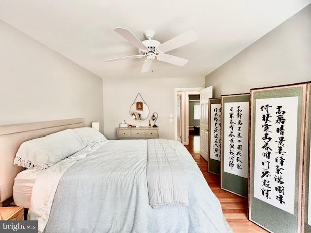 2351 Generation Drive Reston, VA 20191 - Photo 26 of 45 a bed room with a bed and a walk in closet