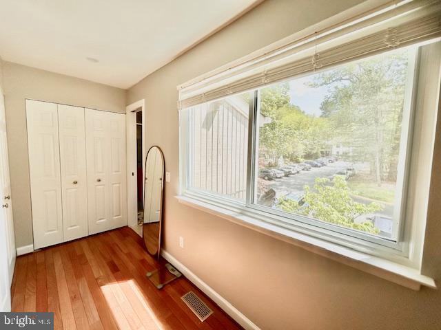 2351 Generation Drive Reston, VA 20191 - Photo 27 of 45 a view of a room with wooden floor and window