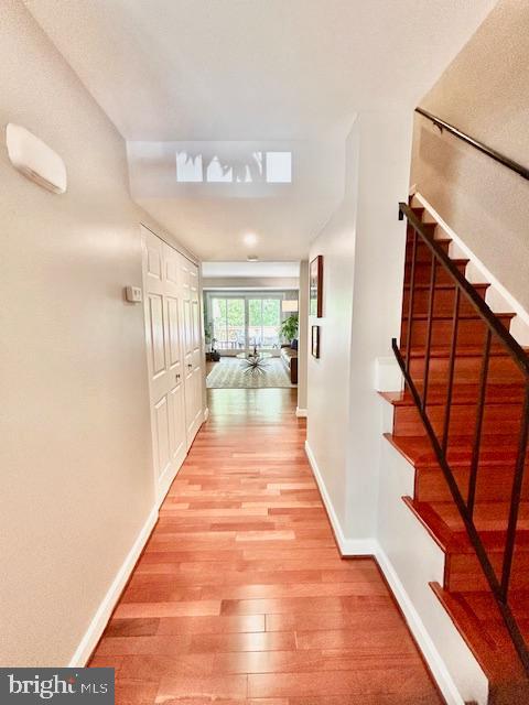 2351 Generation Drive Reston, VA 20191 - Photo 3 of 45 a view of entryway and hall with wooden floor