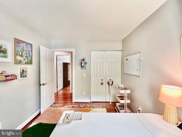 2351 Generation Drive Reston, VA 20191 - Photo 32 of 45 a bedroom with a bed and the view of bathroom