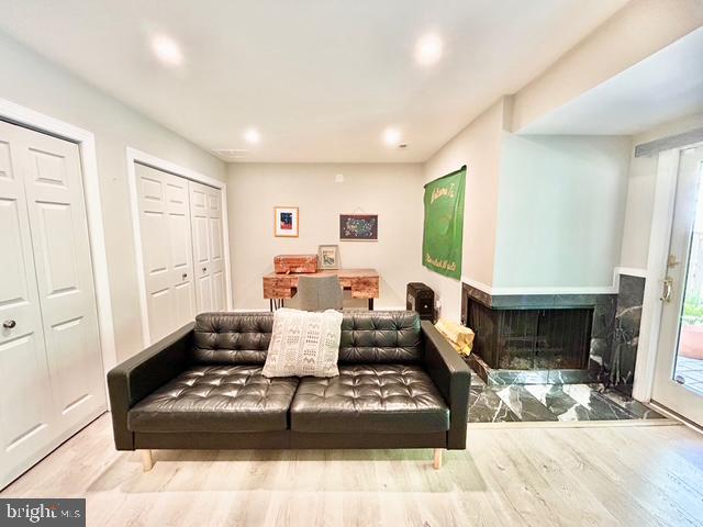 2351 Generation Drive Reston, VA 20191 - Photo 37 of 45 a living room with furniture a fireplace and a large window