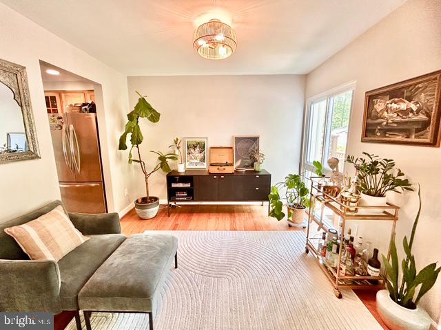 2351 Generation Drive Reston, VA 20191 - Photo 6 of 45 a living room with furniture and a flat screen tv