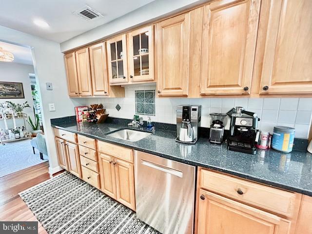 2351 Generation Drive Reston, VA 20191 - Photo 9 of 45 a kitchen with stainless steel appliances granite countertop a sink a stove and white cabinets