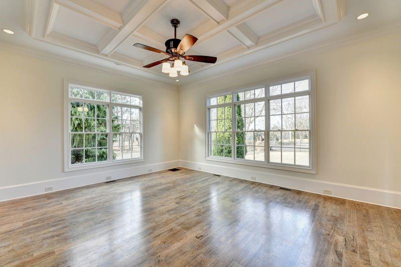 4045 Ridge Road Buford, GA 30519 - Photo 10 of 97 a view of an empty room with wooden floor and a window