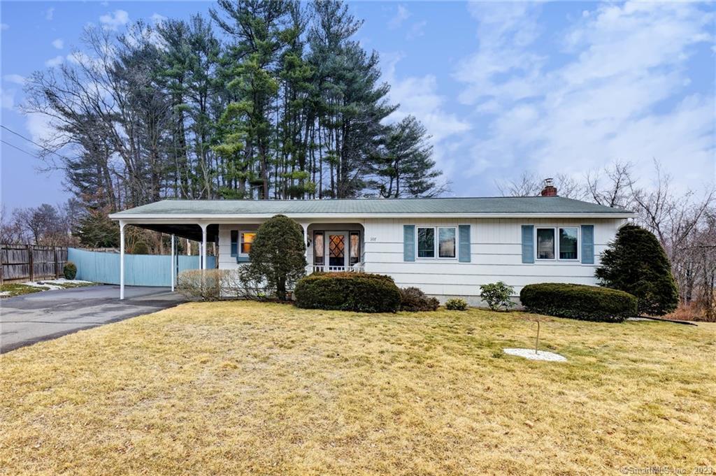 107 Heron Road Enfield, CT 06082 - Photo 1 of 1 a front view of a house with a yard and garage