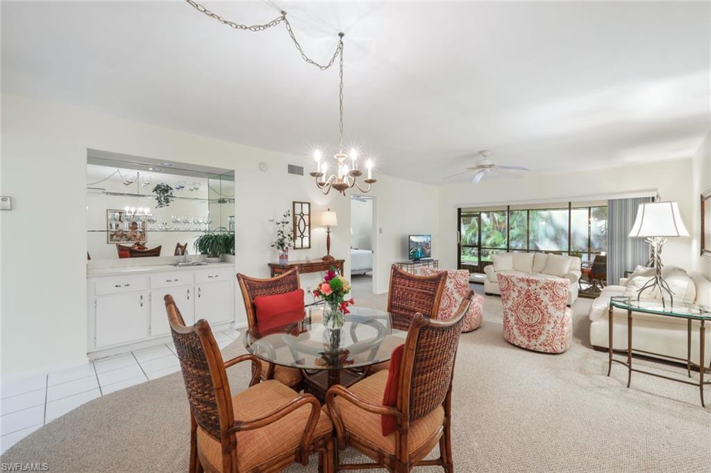 1814 Kings Lake Boulevard, Unit 102 Naples, FL 34112 - Photo 4 of 21 Dining-room with wet bar