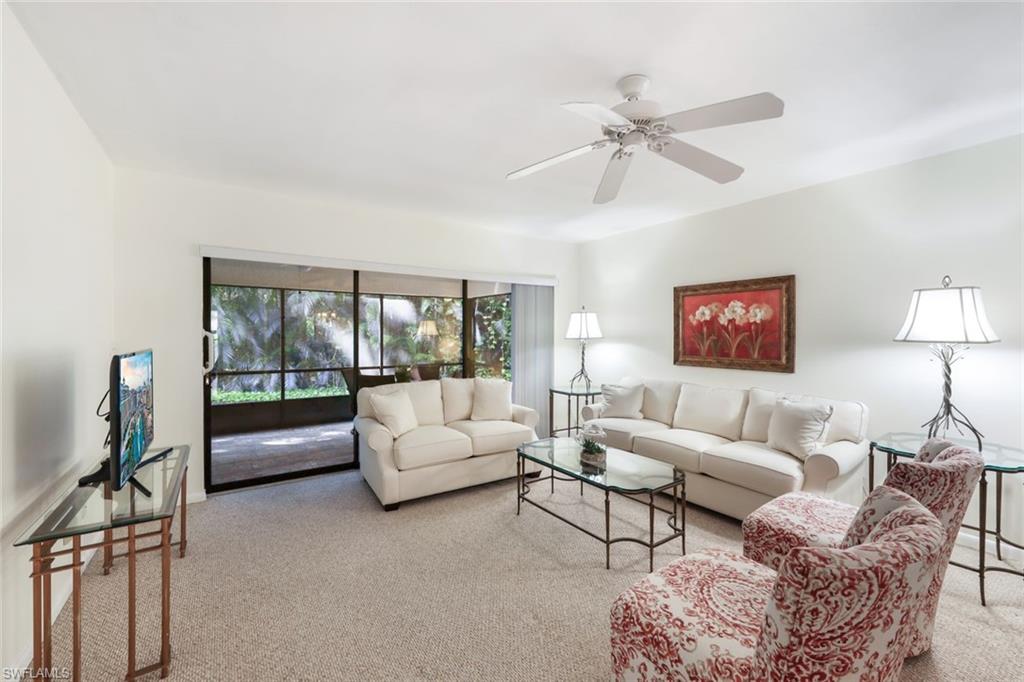 1814 Kings Lake Boulevard, Unit 102 Naples, FL 34112 - Photo 9 of 21 Spacious living-room area