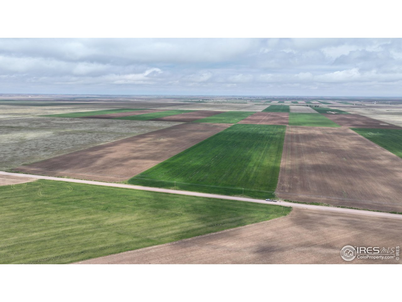 136 County Road Grover, CO 80729 - Photo 11 of 23 a black and white photo of a field