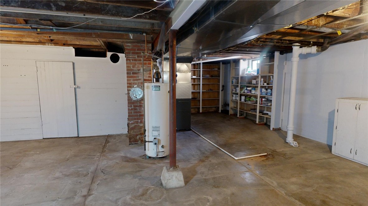 956 North University Avenue Decatur, IL 62522 - Photo 17 of 24 a view of empty room with wooden walls