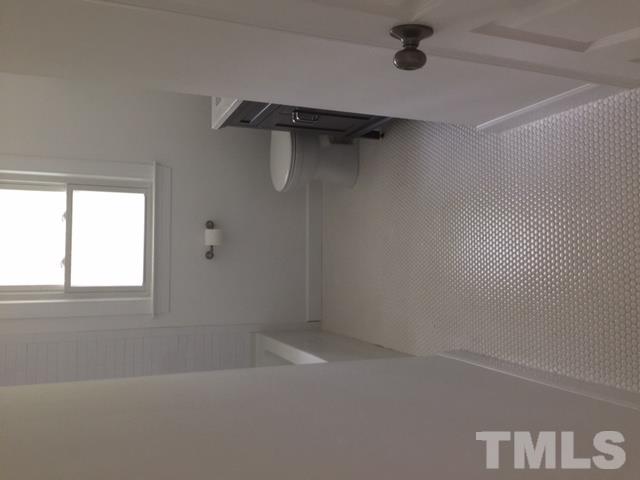 400 Locke Lane Raleigh, NC 27610 - Photo 3 of 3 a view of small space with racks on the wall