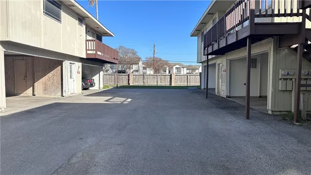 a view of a house with a street