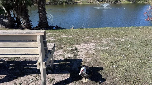 a view of water heater and wooden floor