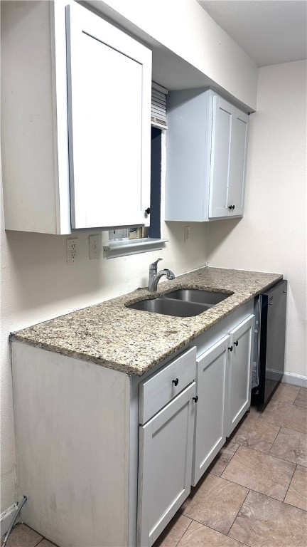 1932 Hidden Way Corpus Christi, TX 78412 - Photo 5 of 14 a kitchen with granite countertop cabinets sink and stove