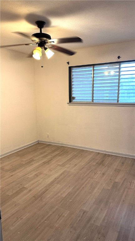1932 Hidden Way Corpus Christi, TX 78412 - Photo 10 of 14 a view of a room with wooden floor