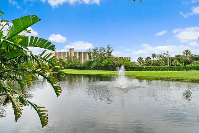 a view of a lake with a big yard