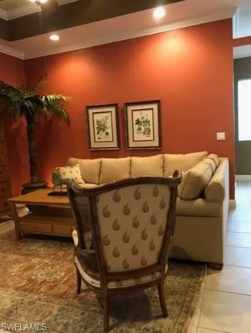 a living room with furniture and a rug