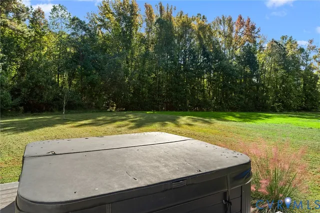 a view of a swimming pool with an outdoor space