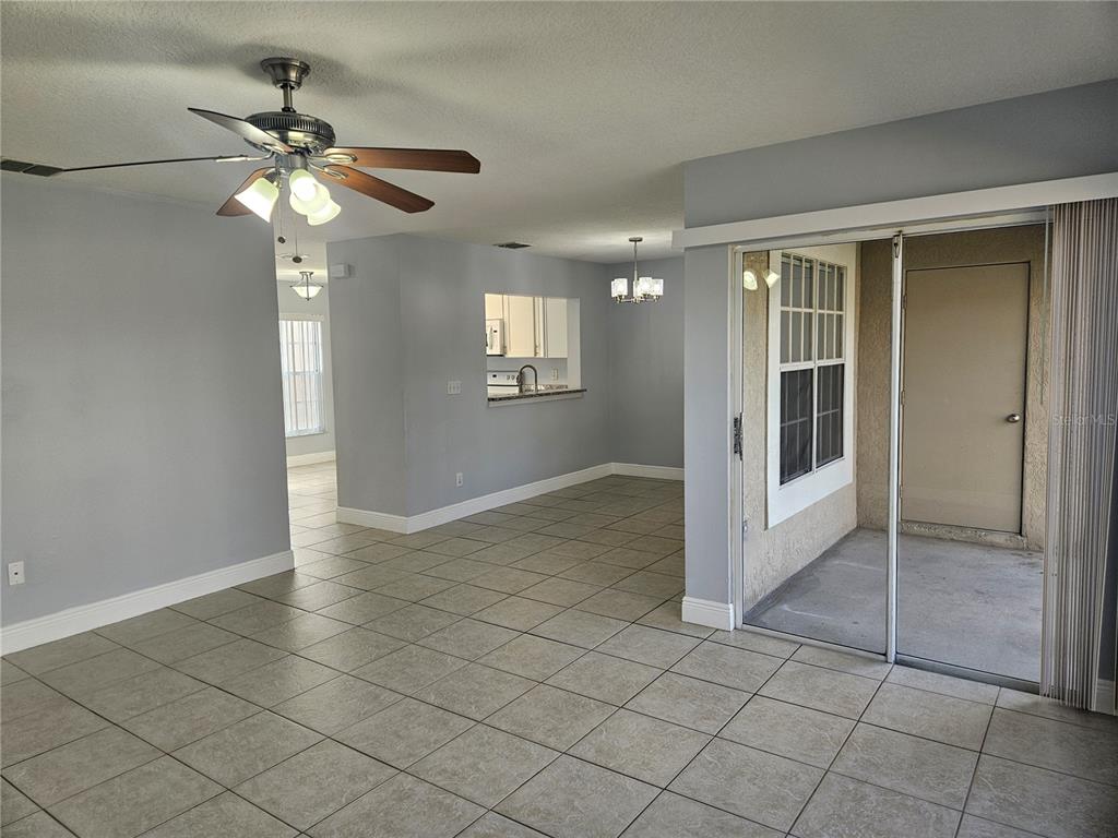2321 Water View Loop Kissimmee, FL 34743 - Photo 14 of 41 an empty room that has a window in it