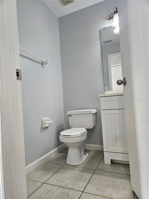 2321 Water View Loop Kissimmee, FL 34743 - Photo 17 of 41 a bathroom with a toilet