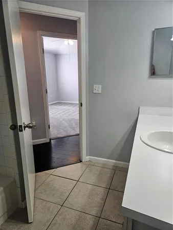 a bathroom with a sink and a toilet