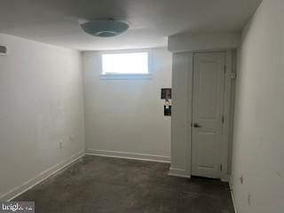 917 North Port Street Baltimore, MD 21205 - Photo 11 of 14 an empty room with a hallway