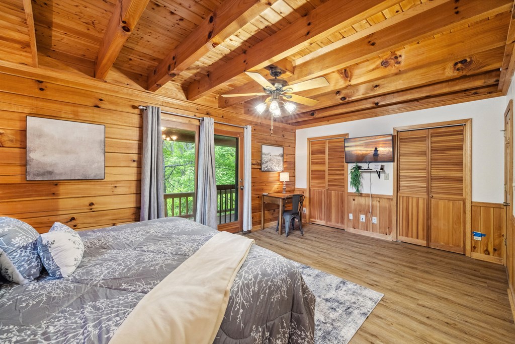 1600 My Mountain Road Morganton, GA 30560 - Photo 12 of 50 a bedroom with a large bed and a large window