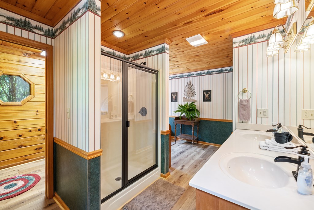 1600 My Mountain Road Morganton, GA 30560 - Photo 13 of 50 a bathroom with a tub and shower