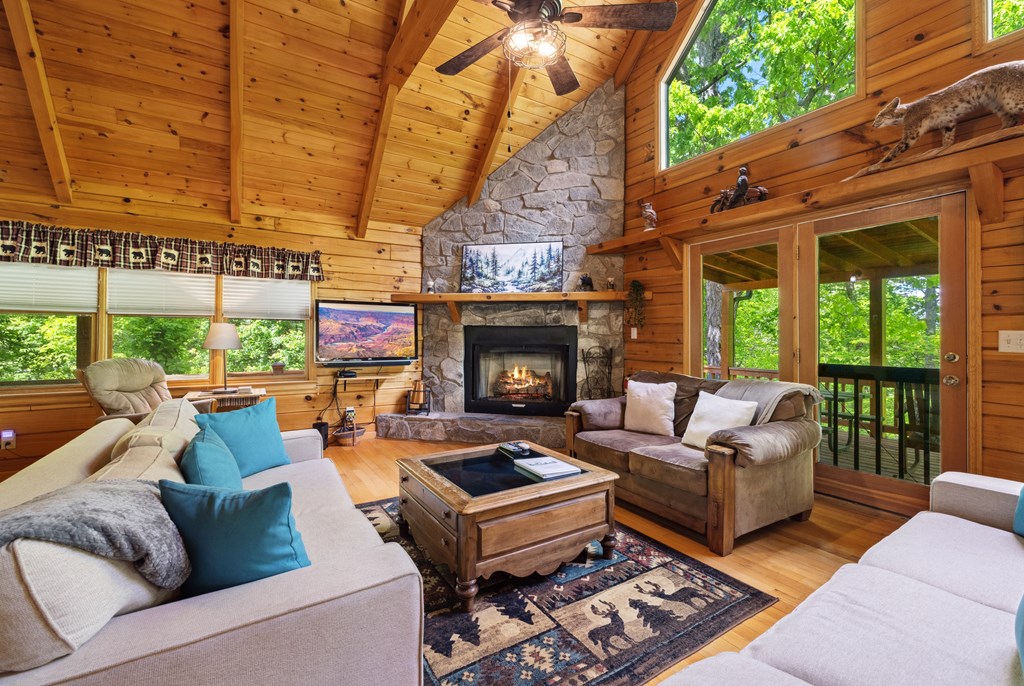 1600 My Mountain Road Morganton, GA 30560 - Photo 8 of 50 a outdoor living space with patio furniture and a fireplace